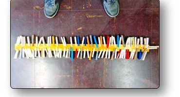 Atelier pince à linge Pincer la règle de la classe